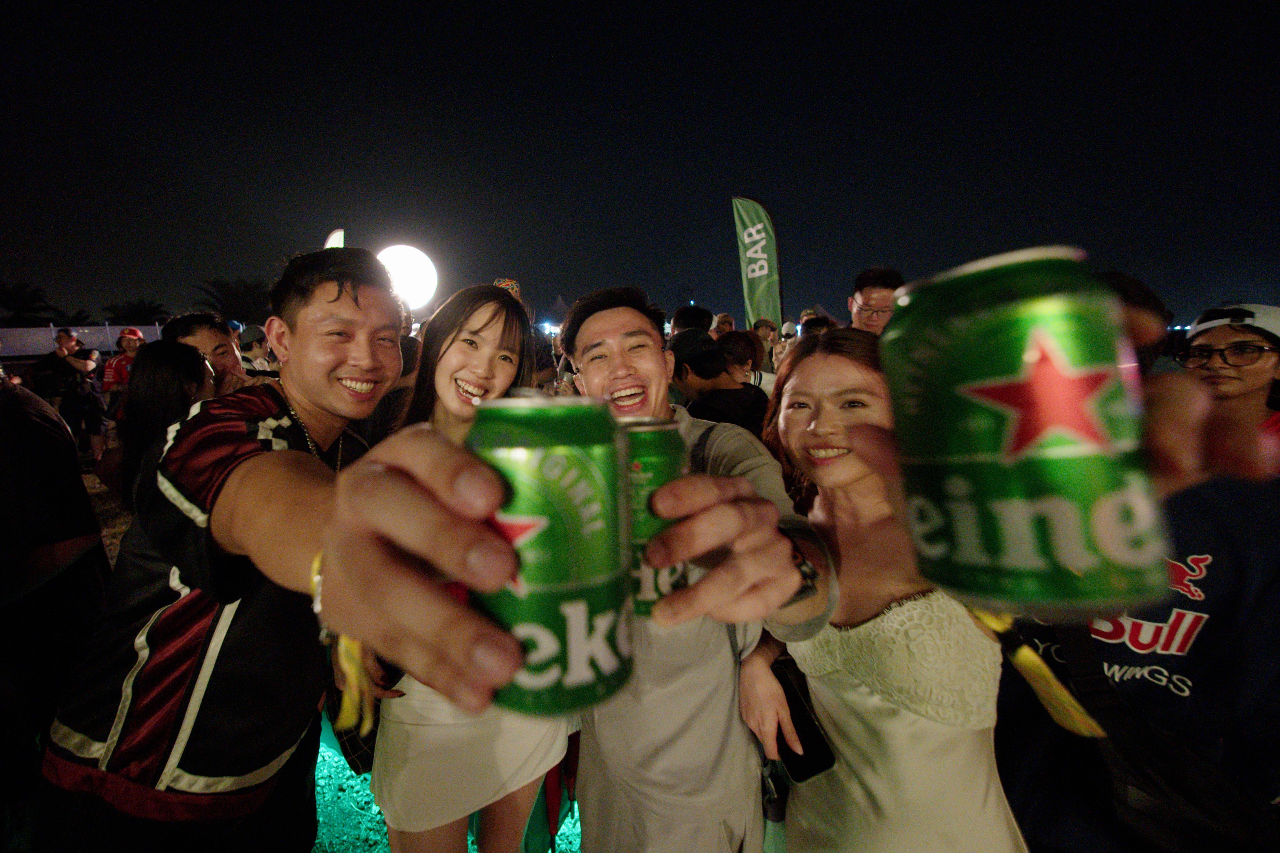 Fans enjoying the race-weekend atmosphere with Heineken® at Sepang International Circuit.