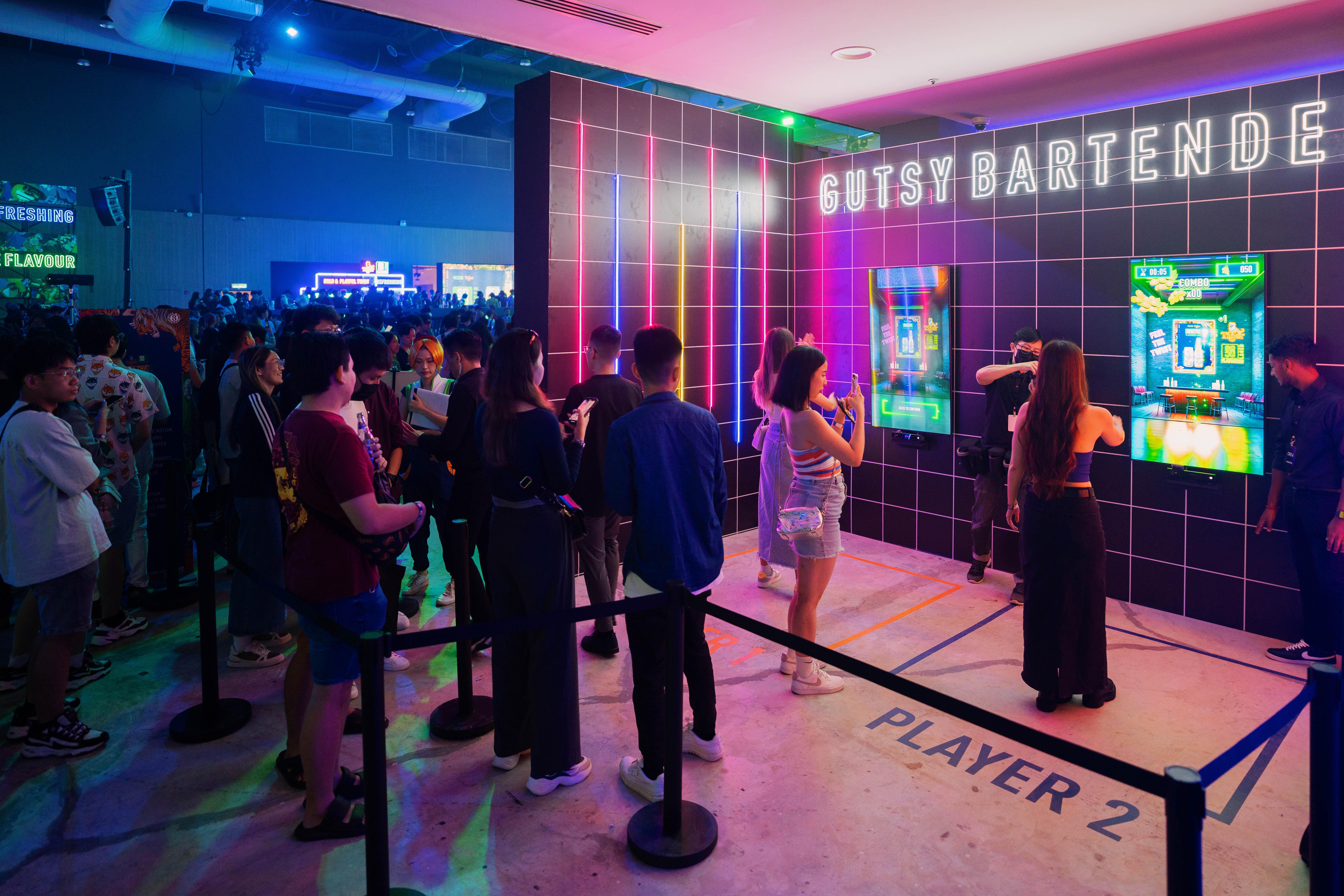 guests-trying-their-hand-at-the-gutsy-bartender-game-at-the-tiger-soju-flavoured-lager-launch-party.jpg